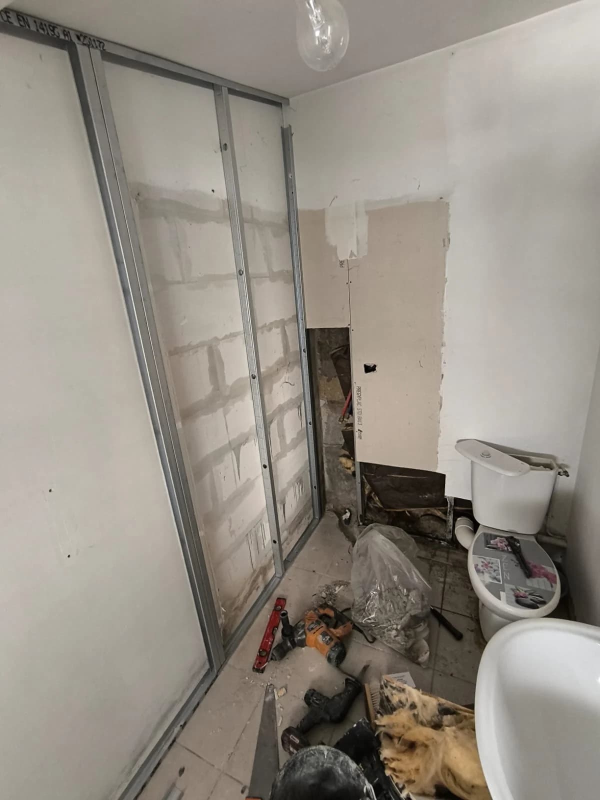 Une douche et ses nouveaux revêtements — photographie 3